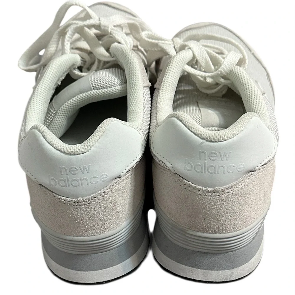 New Balance Grey / White athletic sneakers.